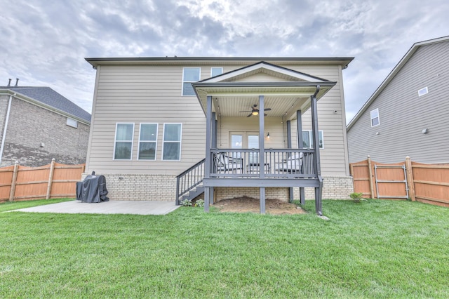 2064 Hedgelawn Dr, Lebanon, TN 37090 - back of property featuring a ceiling fan, a fenced backyard, a patio area, a wooden deck, and a gate