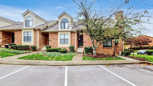 281 Glenstone Cir, Brentwood, TN 37027 - view of front of property with uncovered parking, brick siding, and a shingled roof