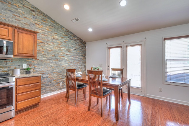 1005 Lark Ct, Spring Hill, TN 37174 - dining room featuring light wood-type flooring, recessed lighting, and high vaulted ceiling