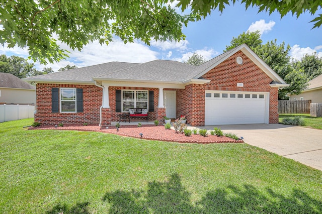 1005 Lark Ct, Spring Hill, TN 37174 - ranch-style house featuring an attached garage, driveway, covered porch, brick siding, and a shingled roof