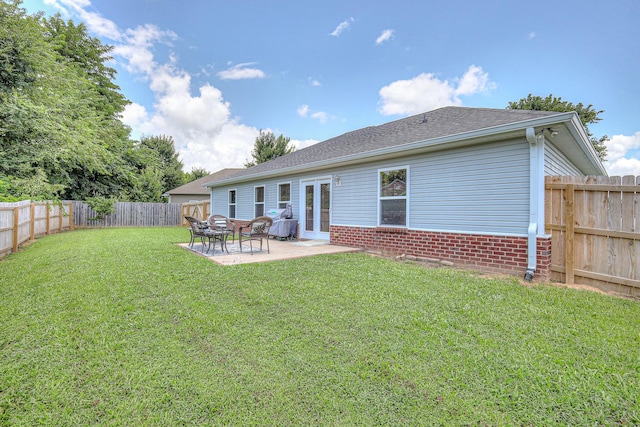 1005 Lark Ct, Spring Hill, TN 37174 - rear view of property featuring a fenced backyard, a patio, and roof with shingles