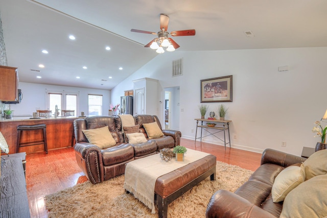 1005 Lark Ct, Spring Hill, TN 37174 - living area with lofted ceiling, light wood finished floors, ceiling fan, and recessed lighting