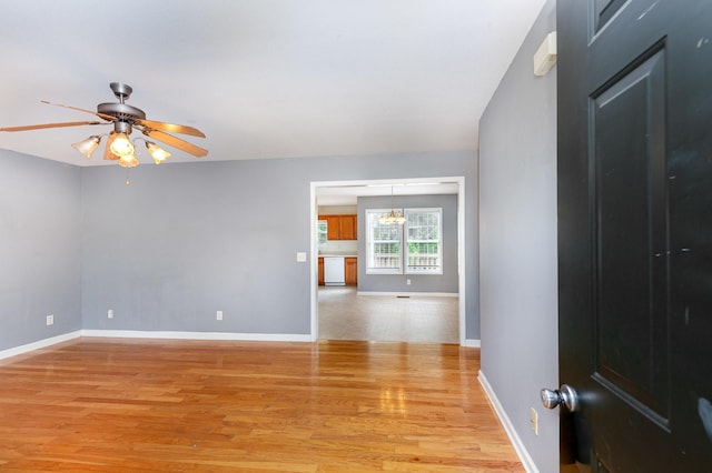 381 Bailey Ln, Pleasant View, TN 37146 - spare room with light wood finished floors, a chandelier, and ceiling fan