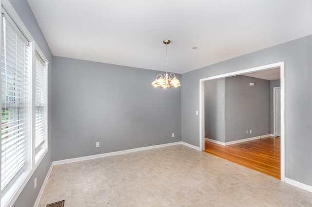 381 Bailey Ln, Pleasant View, TN 37146 - empty room featuring a chandelier and light flooring