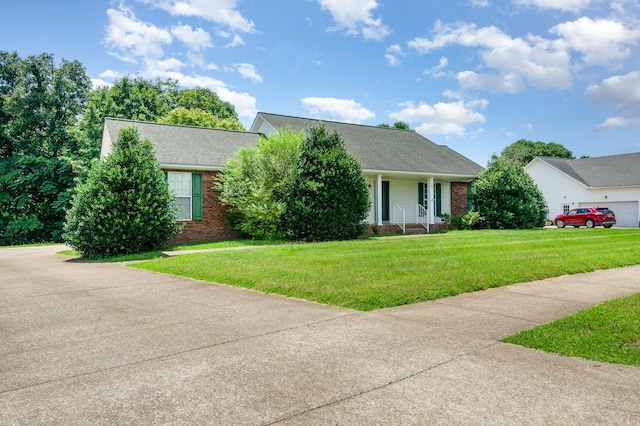 381 Bailey Ln, Pleasant View, TN 37146 - view of front facade with a front yard, brick siding, and roof with shingles