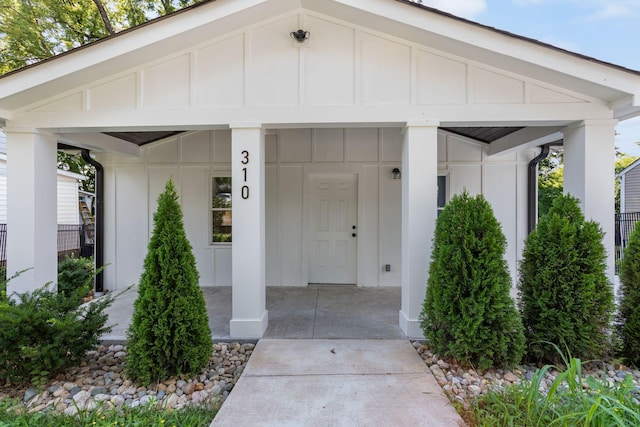310 E Highland Dr, Columbia, TN 38401 - property entrance with board and batten siding