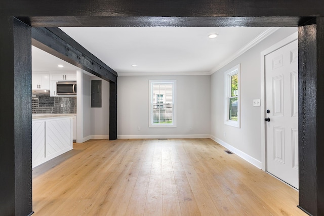 310 E Highland Dr, Columbia, TN 38401 - entryway with ornamental molding, electric panel, light wood-type flooring, and recessed lighting
