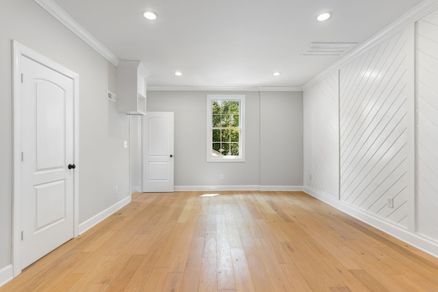 310 E Highland Dr, Columbia, TN 38401 - spare room featuring light wood finished floors, crown molding, and recessed lighting