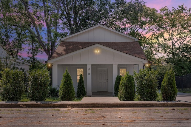 310 E Highland Dr, Columbia, TN 38401 - view of front facade featuring a shingled roof and board and batten siding