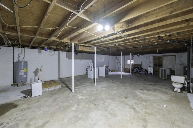 55 Lancaster Ln, Parsons, TN 38363 - unfinished basement with electric water heater