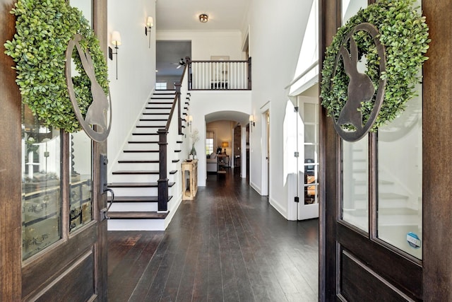 4376 Pretoria Run, Murfreesboro, TN 37128 - entryway with arched walkways, stairway, wood-type flooring, a high ceiling, and ornamental molding