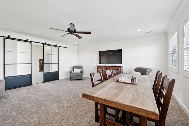 4376 Pretoria Run, Murfreesboro, TN 37128 - dining area with carpet, ceiling fan, a barn door, ornamental molding, and recessed lighting