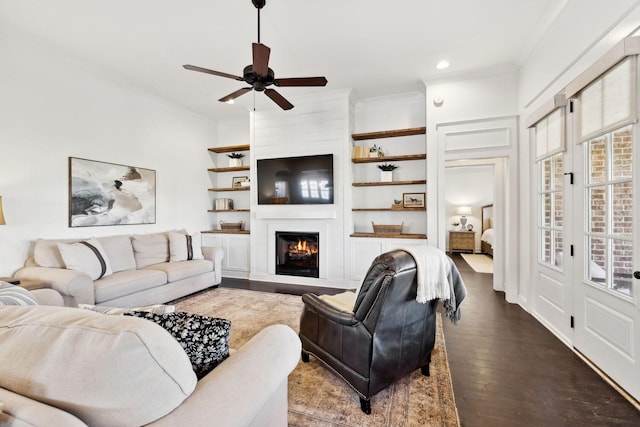 4376 Pretoria Run, Murfreesboro, TN 37128 - living room with dark wood-type flooring, ceiling fan, recessed lighting, a large fireplace, and ornamental molding