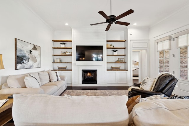 4376 Pretoria Run, Murfreesboro, TN 37128 - living room featuring crown molding, a ceiling fan, a large fireplace, recessed lighting, and wood finished floors