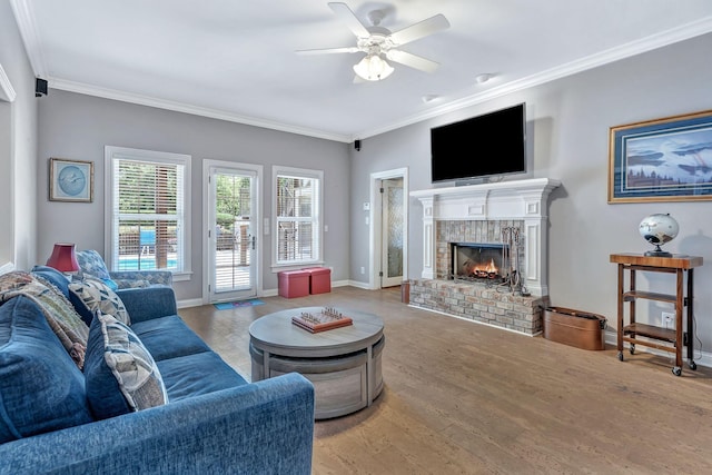 1660 Stokley Ln, Old Hickory, TN 37138 - living room with crown molding, a ceiling fan, a fireplace, and wood finished floors