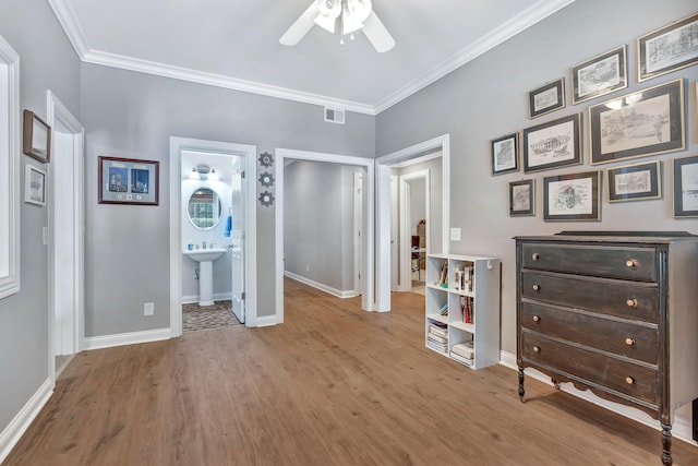 1660 Stokley Ln, Old Hickory, TN 37138 - bedroom featuring wood finished floors, ornamental molding, ensuite bathroom, and ceiling fan
