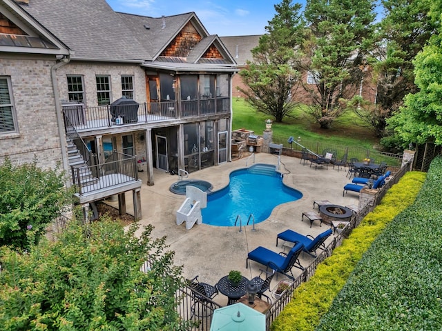 1660 Stokley Ln, Old Hickory, TN 37138 - view of pool featuring an outdoor fire pit, stairway, a patio area, a fenced backyard, and a sunroom