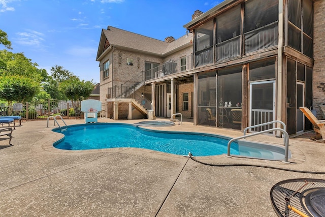 1660 Stokley Ln, Old Hickory, TN 37138 - view of swimming pool featuring stairs, a patio, an in-ground hot tub, and a sunroom