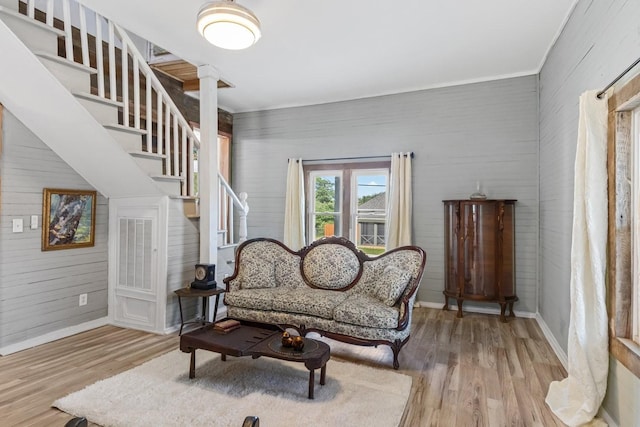 584 Limestone Ave, Lewisburg, TN 37091 - living room with wood finished floors, stairway, wooden walls, and ornamental molding