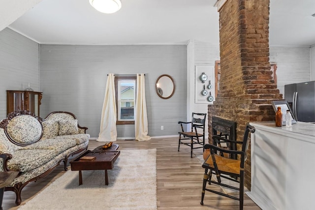 584 Limestone Ave, Lewisburg, TN 37091 - living area with wood finished floors and a brick fireplace