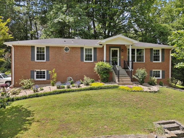 1148 Green Valley Dr, Lewisburg, TN 37091 - view of front of home with a front yard and brick siding