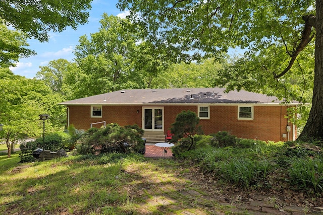1148 Green Valley Dr, Lewisburg, TN 37091 - back of property with brick siding and entry steps