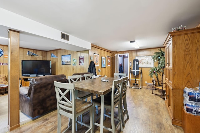 1148 Green Valley Dr, Lewisburg, TN 37091 - dining area featuring wood walls and light wood finished floors