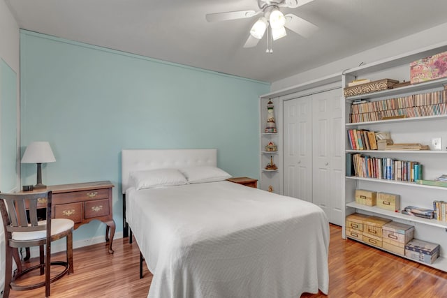 1530 Potter Dr, Columbia, TN 38401 - bedroom with wood finished floors, a closet, and ceiling fan