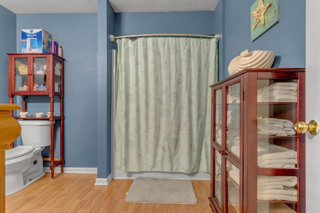 1530 Potter Dr, Columbia, TN 38401 - bathroom featuring wood finished floors and a shower with curtain