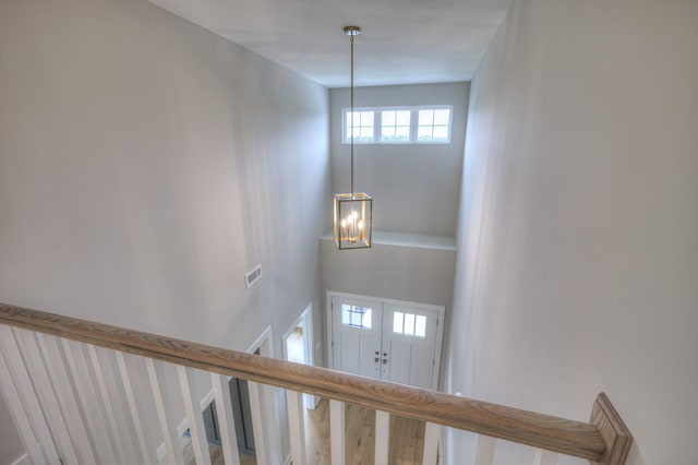 4016 Runyan Cv, Murfreesboro, TN 37127 - stairs featuring a chandelier and a towering ceiling