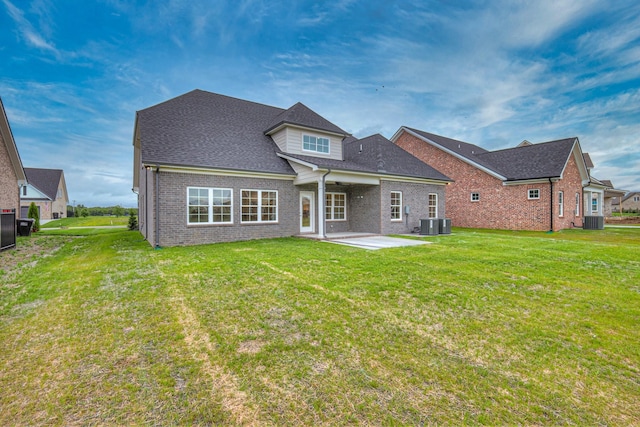 4016 Runyan Cv, Murfreesboro, TN 37127 - back of property with brick siding, a patio, a lawn, a shingled roof, and a ceiling fan