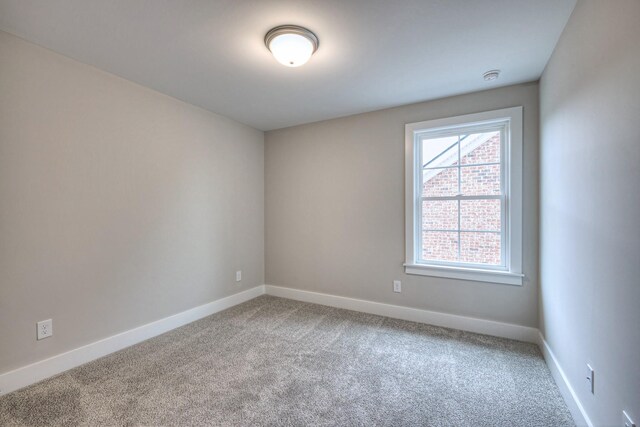 4016 Runyan Cv, Murfreesboro, TN 37127 - carpeted empty room with baseboards and a smoke detector