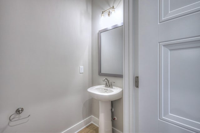 4016 Runyan Cv, Murfreesboro, TN 37127 - bathroom with baseboards and wood finished floors