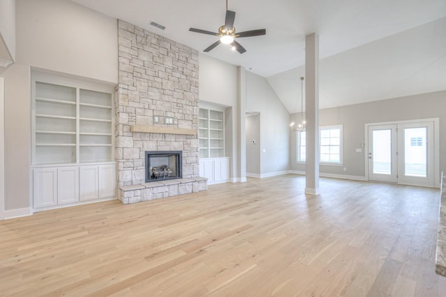 5560 Sinclair Ct, Murfreesboro, TN 37127 - unfurnished living room featuring a ceiling fan, built in features, wood finished floors, a fireplace, and high vaulted ceiling