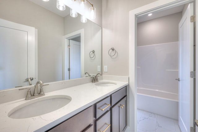 5560 Sinclair Ct, Murfreesboro, TN 37127 - full bath featuring marble look tiles, double vanity, and shower / washtub combination