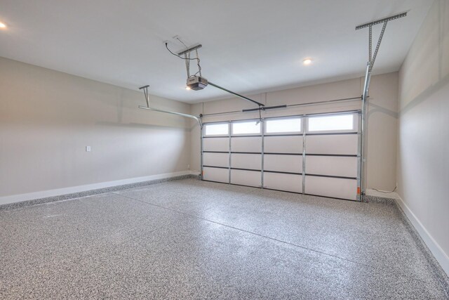 5560 Sinclair Ct, Murfreesboro, TN 37127 - garage with a garage door opener and recessed lighting
