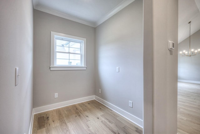 5560 Sinclair Ct, Murfreesboro, TN 37127 - spare room featuring light wood-style floors, a chandelier, and ornamental molding