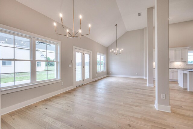 5560 Sinclair Ct, Murfreesboro, TN 37127 - unfurnished dining area with a chandelier, high vaulted ceiling, plenty of natural light, and light wood finished floors