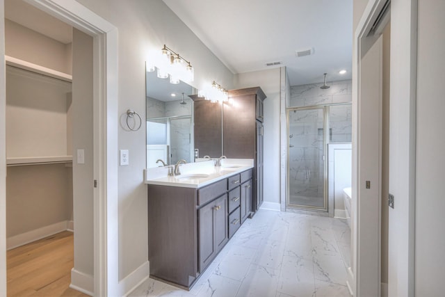 5560 Sinclair Ct, Murfreesboro, TN 37127 - full bathroom with a marble finish shower, double vanity, a freestanding bath, marble look tile flooring, and a spacious closet