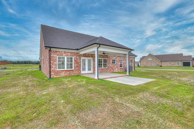 5560 Sinclair Ct, Murfreesboro, TN 37127 - back of property featuring ceiling fan, a patio, a lawn, and brick siding