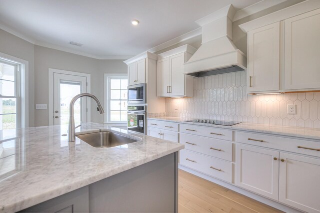 4113 Cile Ct, Murfreesboro, TN 37127 - kitchen featuring custom range hood, appliances with stainless steel finishes, healthy amount of natural light, decorative backsplash, and recessed lighting