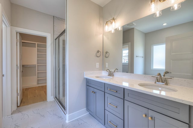 4113 Cile Ct, Murfreesboro, TN 37127 - full bathroom featuring double vanity, a shower stall, a spacious closet, and marble finish flooring