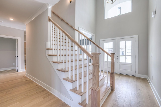 4113 Cile Ct, Murfreesboro, TN 37127 - foyer with wood finished floors, stairs, healthy amount of natural light, a towering ceiling, and recessed lighting