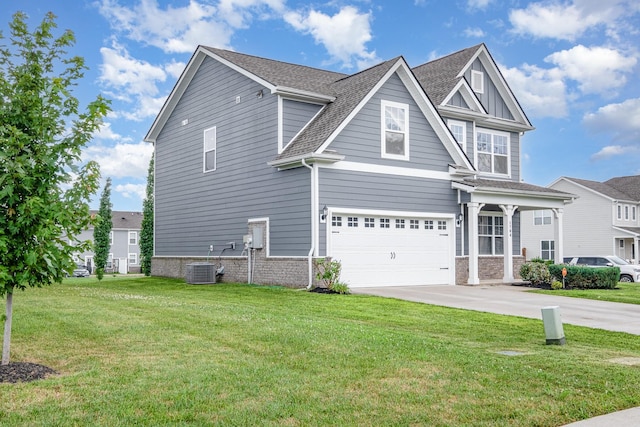 1704 Lannister Ave, Murfreesboro, TN 37128 - view of front of home featuring driveway, a garage, a front yard, and a shingled roof