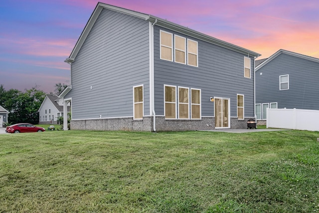 1704 Lannister Ave, Murfreesboro, TN 37128 - back of property at dusk with a patio