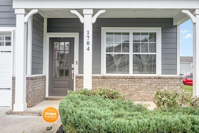 1704 Lannister Ave, Murfreesboro, TN 37128 - entrance to property with a porch and brick siding