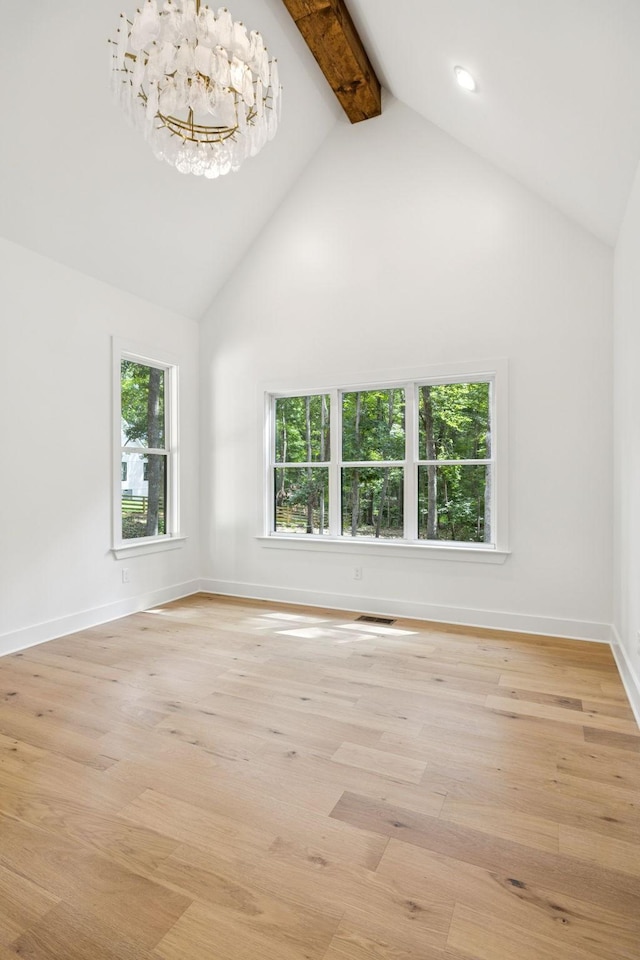 1007 Pheasant Ct, Kingston Springs, TN 37082 - unfurnished room featuring high vaulted ceiling, beam ceiling, a chandelier, and light wood-style flooring
