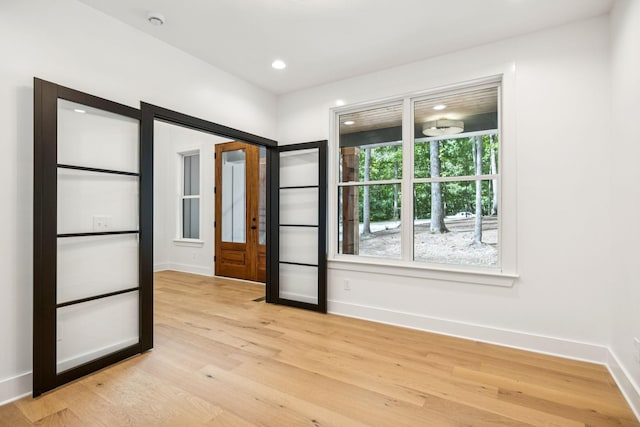 1007 Pheasant Ct, Kingston Springs, TN 37082 - unfurnished room featuring light wood finished floors, a smoke detector, and recessed lighting