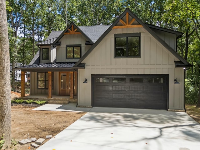 1007 Pheasant Ct, Kingston Springs, TN 37082 - modern farmhouse style home with covered porch, concrete driveway, an attached garage, board and batten siding, and roof with shingles