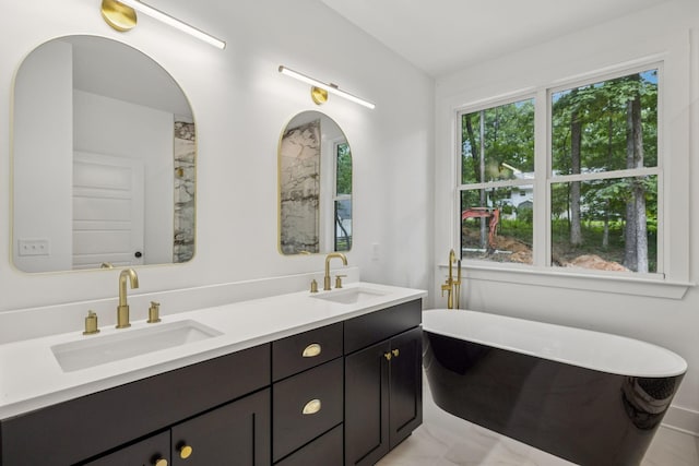1007 Pheasant Ct, Kingston Springs, TN 37082 - full bathroom with double vanity and a freestanding tub